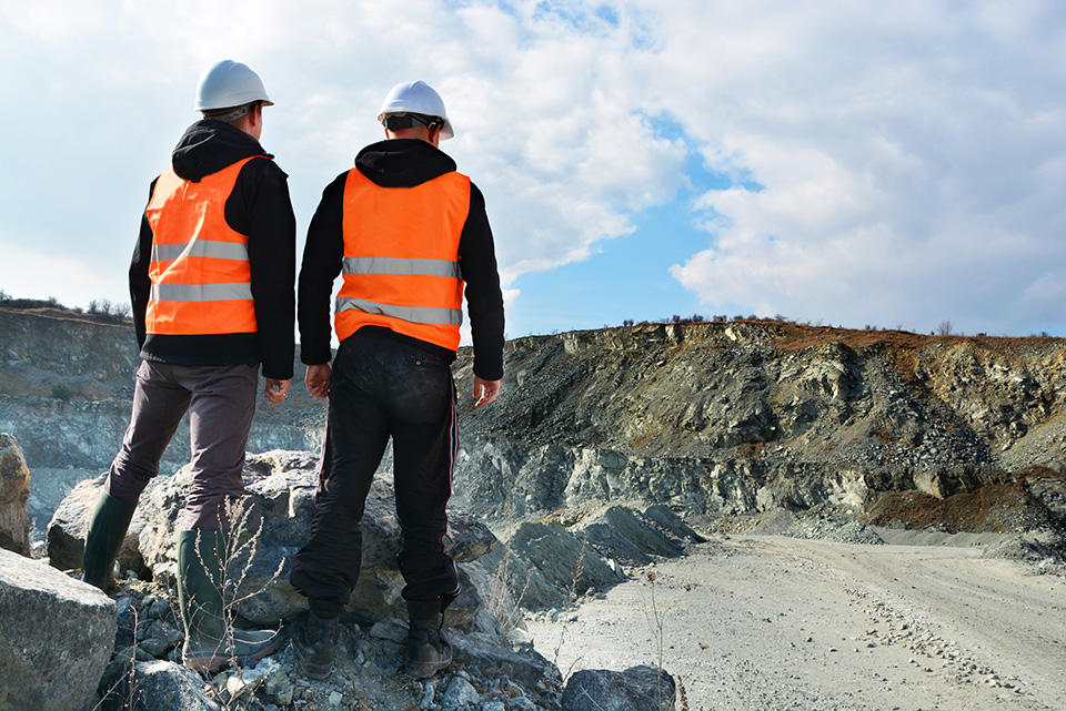 Photo of workers surveying a site | featured image for Services.