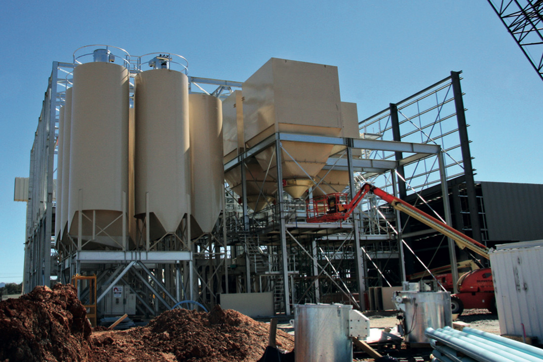 Silos attached to a new materials handling facility | Featured image for the Material Handling Equipment Supplier product category page from CMQ Engineering.