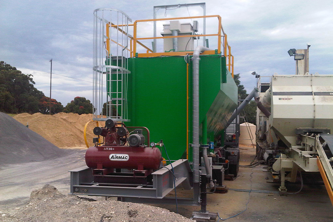 Unattached mobile green silo on site | featured image for Mobile Silo & Loss of Weight / Cement Weigh Hopper.
