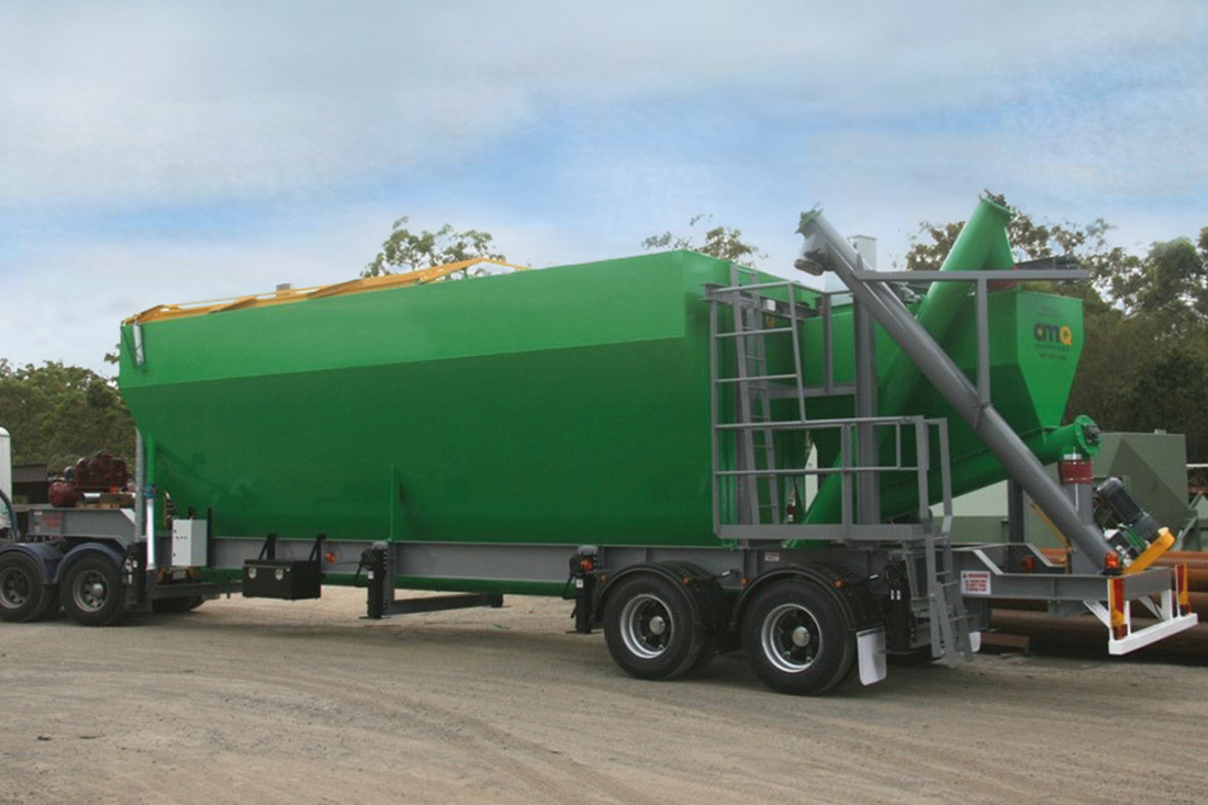 Green mobile silo on site | featured image for Mobile Silo & Loss of Weight / Cement Weigh Hopper.