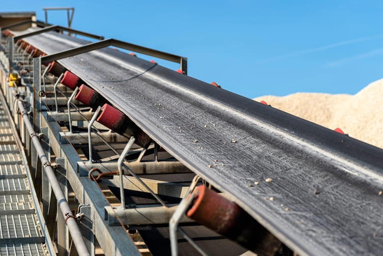 Close up shot of a conveyor | Featured image of the Different Types of Conveyor blog page